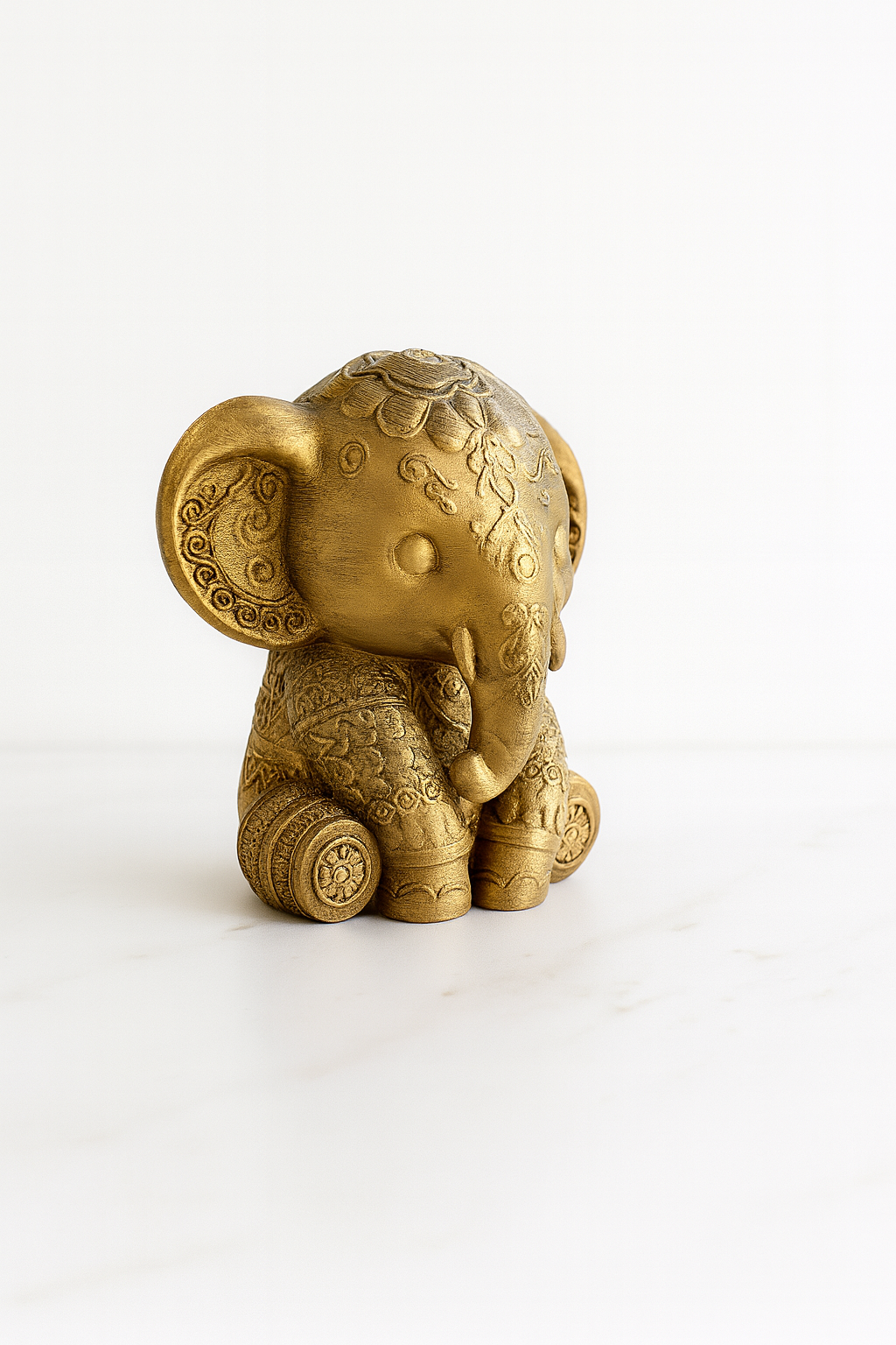 Golden Elephant Figurine – Hand-Painted Ornamental Sculpture