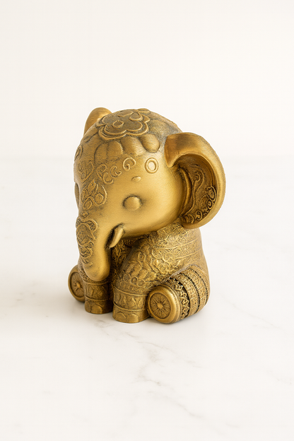 Golden Elephant Figurine – Hand-Painted Ornamental Sculpture