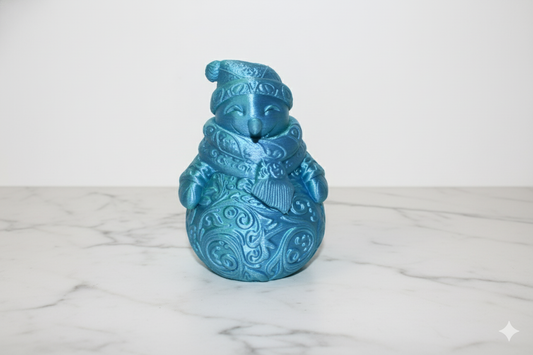 Blue Snowman Figurine with Ornamental Details – Elegant Winter Decoration